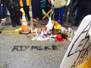 A makeshift memorial for another black boy felled by a policeman's gun.